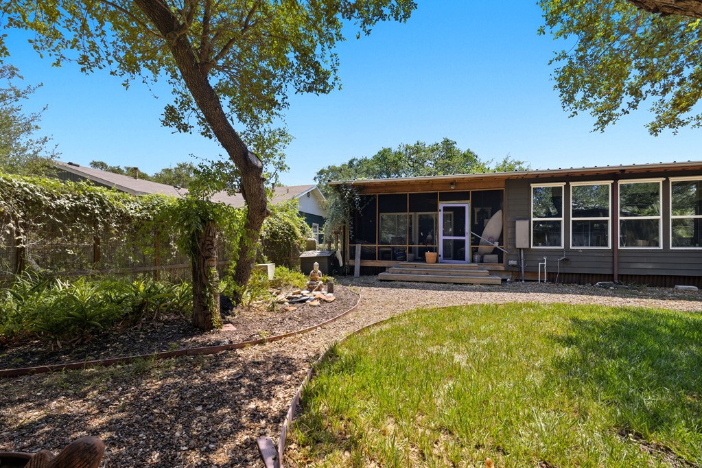 1908 Glass Avenue Rockport, TX 78382 - Photo 33 of 40 a view of a house with swimming pool and porch with furniture