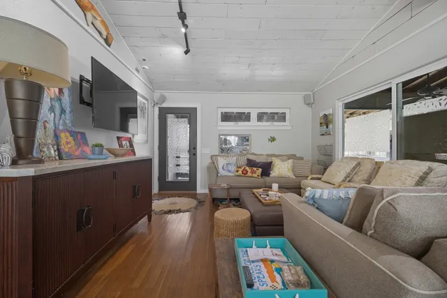 a view of a living room and a chandelier