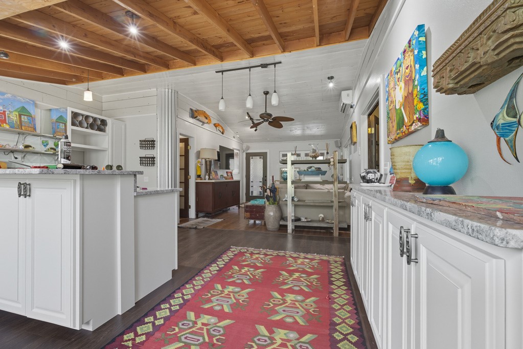 1908 Glass Avenue Rockport, TX 78382 - Photo 10 of 40 a very nice looking room with a rug and a table