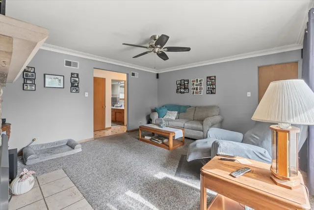 a living room with furniture and a couch