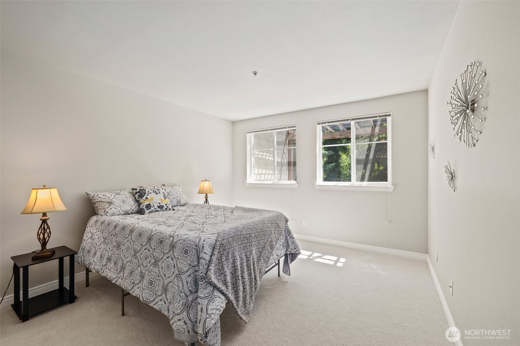 17432 Bothell Way Northeast, Unit B302 Bothell, WA 98011 - Photo 17 of 38 a bedroom with a bed and window
