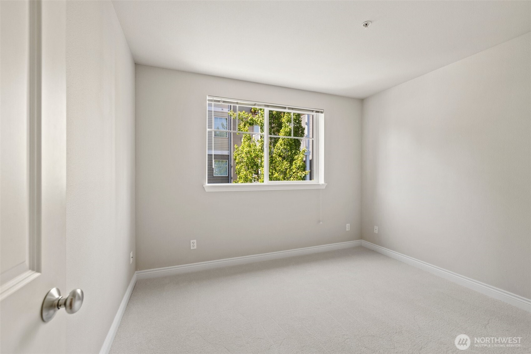 17432 Bothell Way Northeast, Unit B302 Bothell, WA 98011 - Photo 23 of 38 an empty room with a window