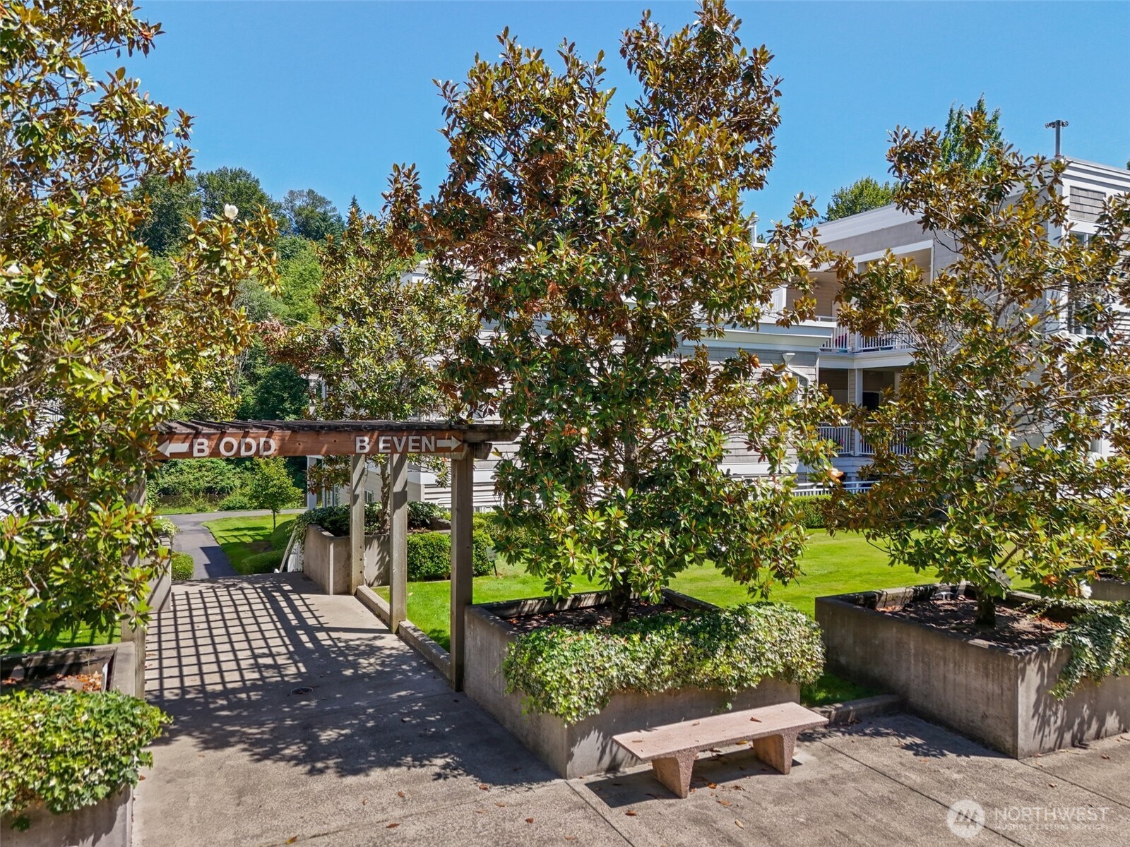17432 Bothell Way Northeast, Unit B302 Bothell, WA 98011 - Photo 29 of 38 a view of a garden with wooden fence
