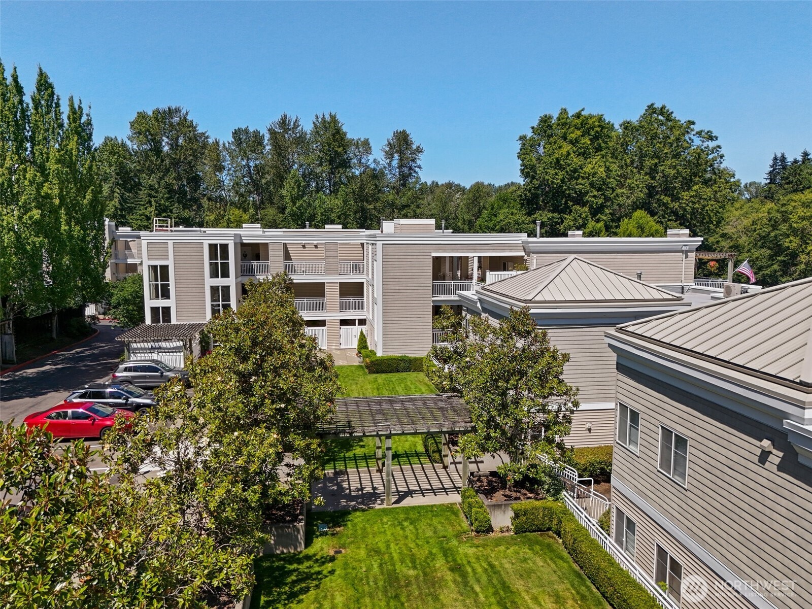 17432 Bothell Way Northeast, Unit B302 Bothell, WA 98011 - Photo 30 of 38 a view of a house with a yard