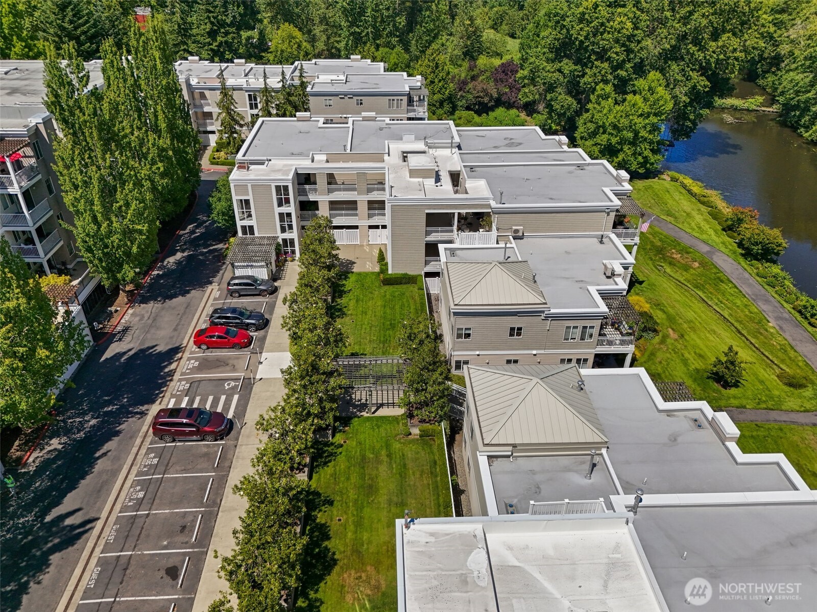 17432 Bothell Way Northeast, Unit B302 Bothell, WA 98011 - Photo 33 of 38 an aerial view of residential houses with outdoor space