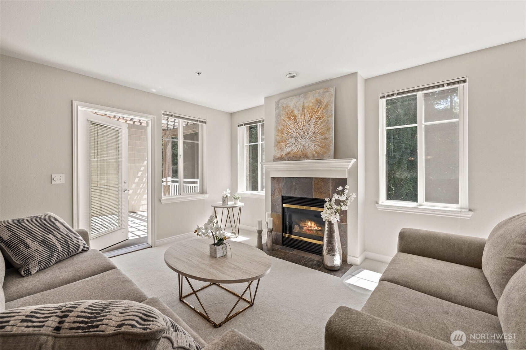 17432 Bothell Way Northeast, Unit B302 Bothell, WA 98011 - Photo 7 of 38 a living room with furniture and a fireplace