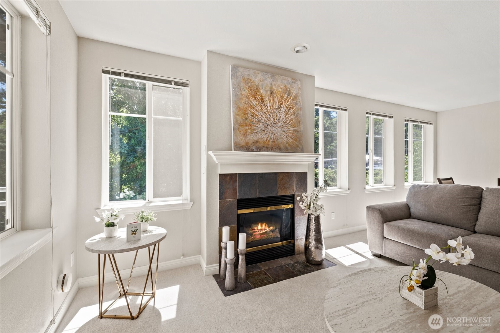 17432 Bothell Way Northeast, Unit B302 Bothell, WA 98011 - Photo 8 of 38 a living room with furniture and a fireplace