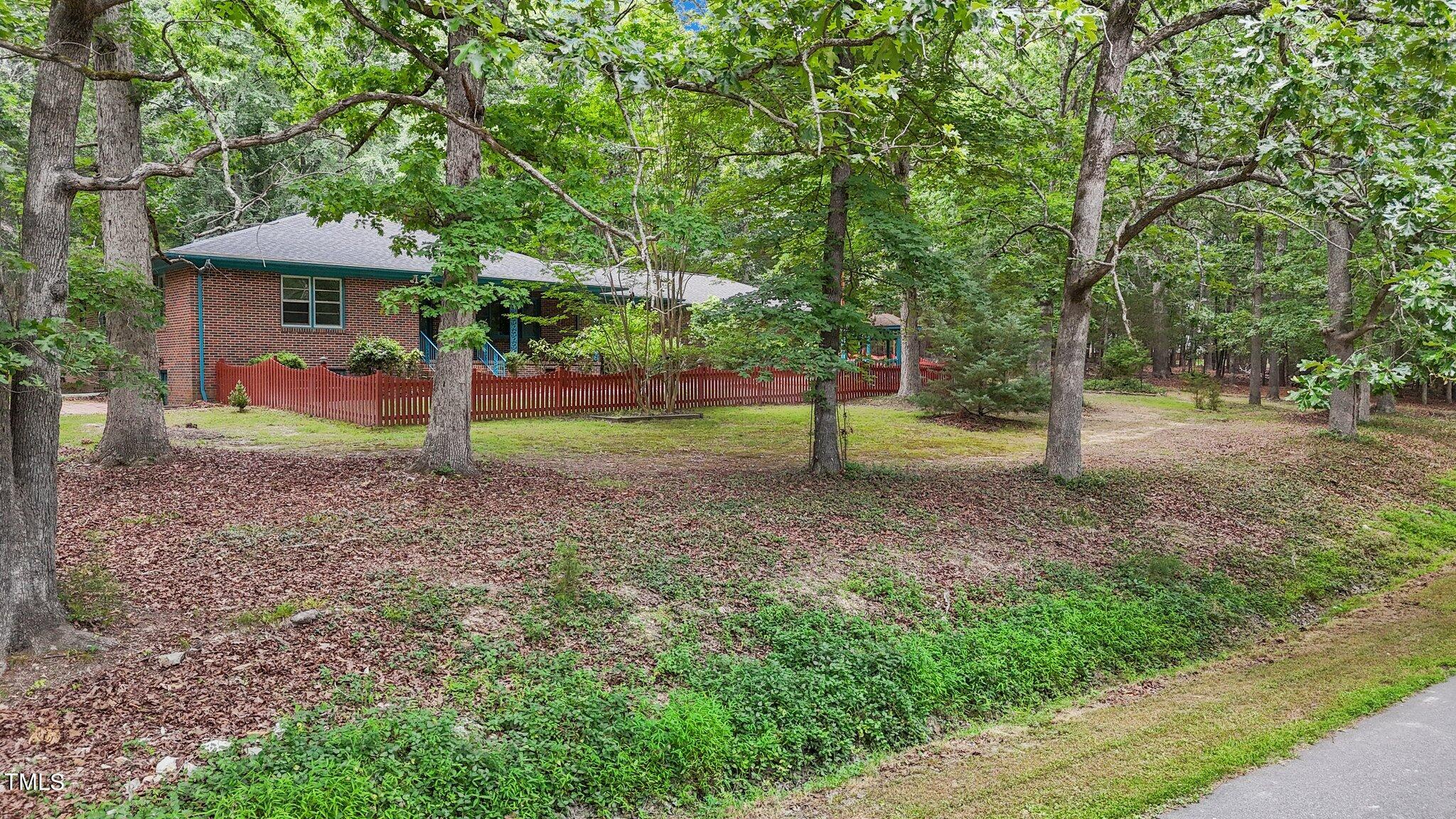 5211 Summit Ridge Drive Durham, NC 27712 - Photo 3 of 53 2-web-or-mls-DJI_20240613141606_0129_D