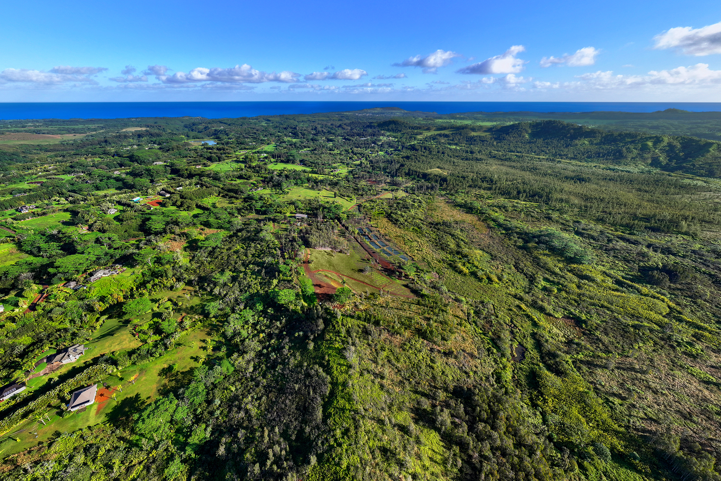 2818 Kamookoa Road, Unit 5 Kilauea, HI 96754 - Photo 14 of 29 a view of a city and sunset