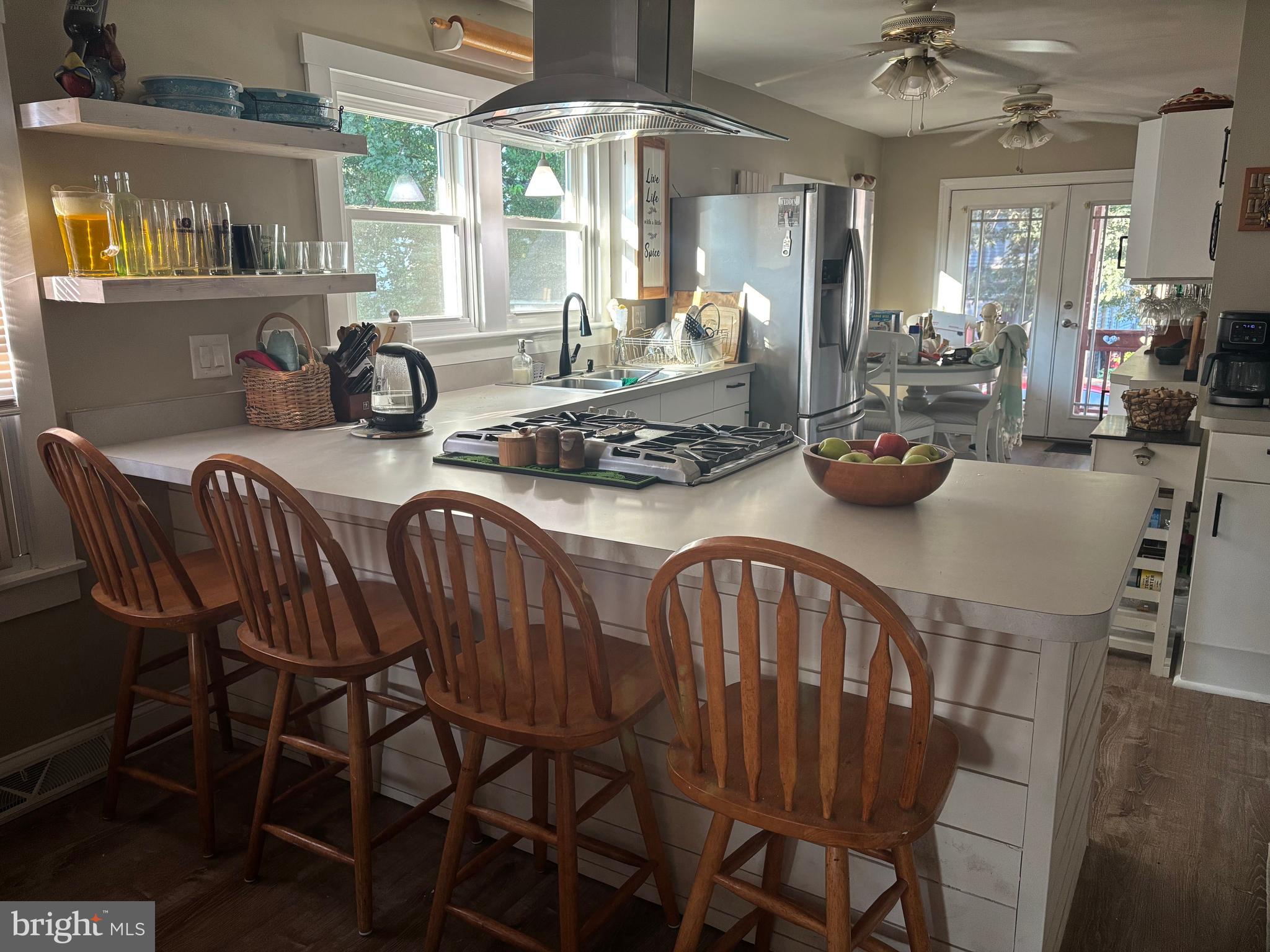 416 Wesley Avenue Pitman, NJ 08071 - Photo 12 of 47 a view of a dining room with furniture and a chandelier