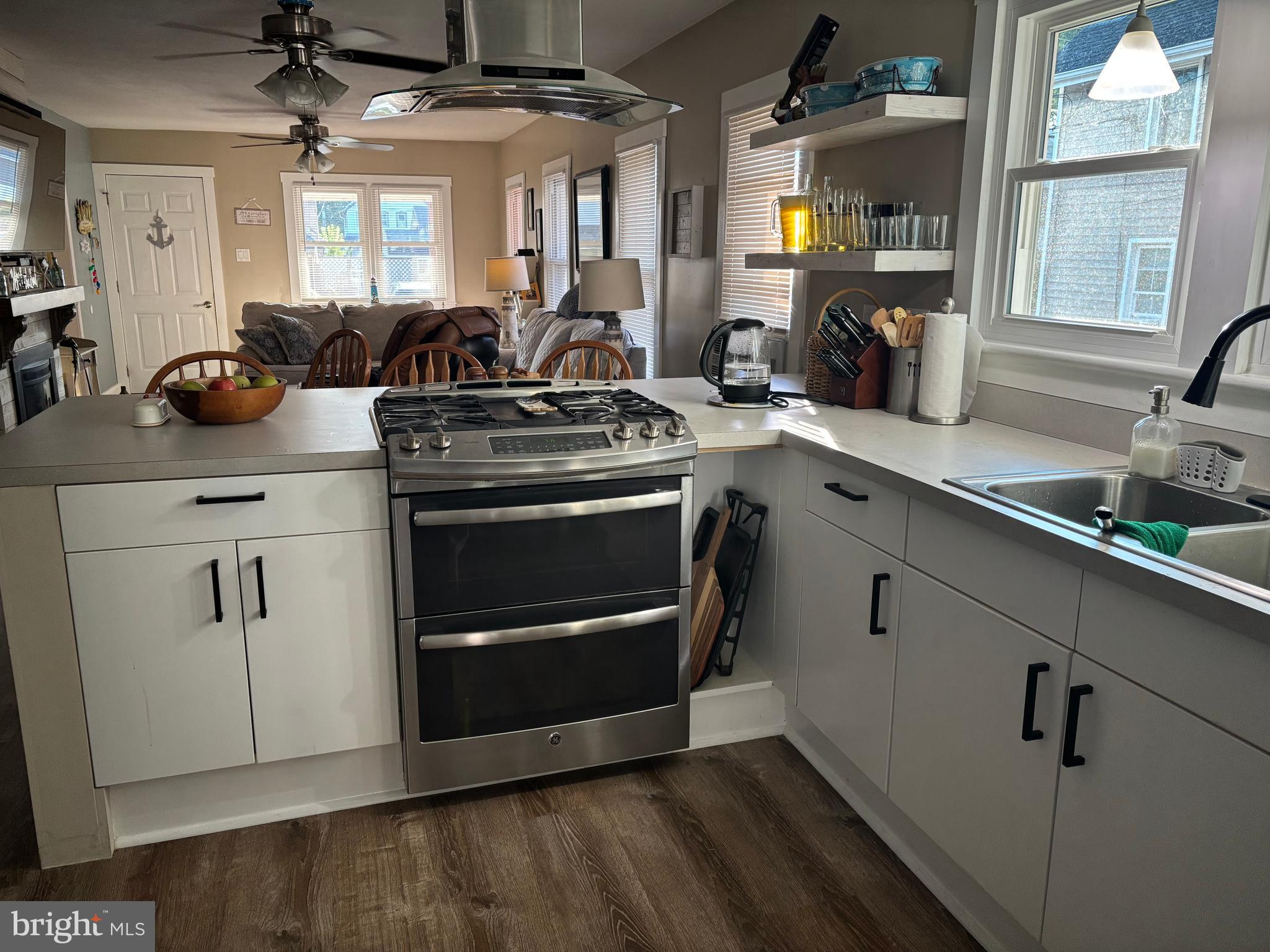 416 Wesley Avenue Pitman, NJ 08071 - Photo 17 of 47 a kitchen with granite countertop a sink stainless steel appliances and cabinets