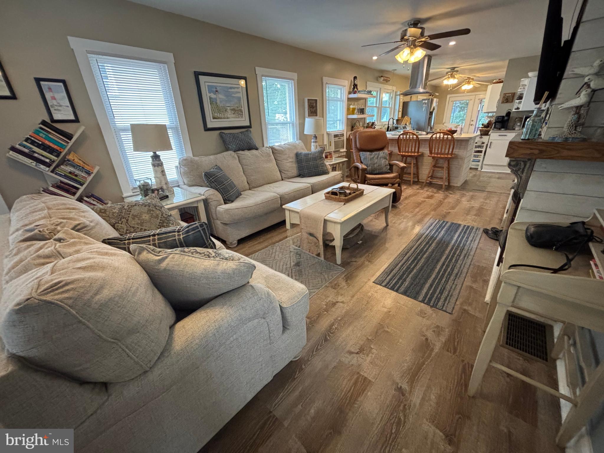 416 Wesley Avenue Pitman, NJ 08071 - Photo 27 of 47 a living room with furniture and a fireplace