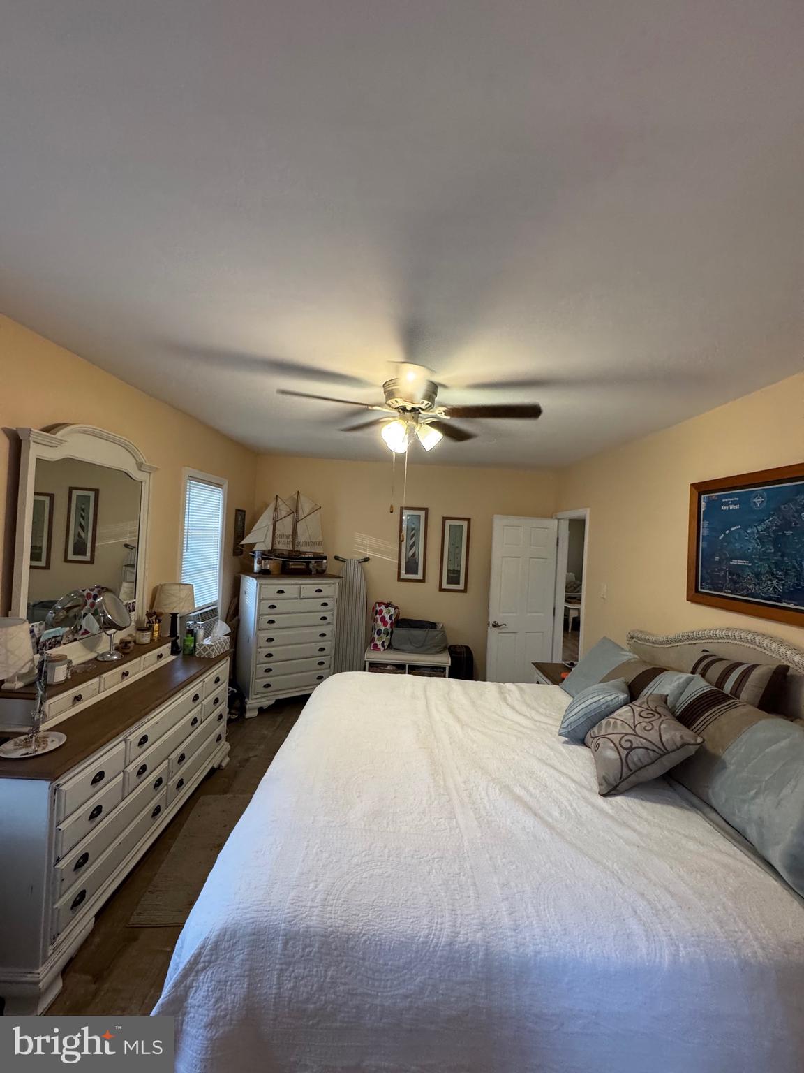 416 Wesley Avenue Pitman, NJ 08071 - Photo 34 of 47 a bedroom with a large bed and a tv