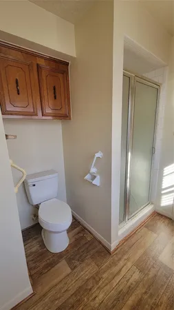 a bathroom with a toilet and a sink