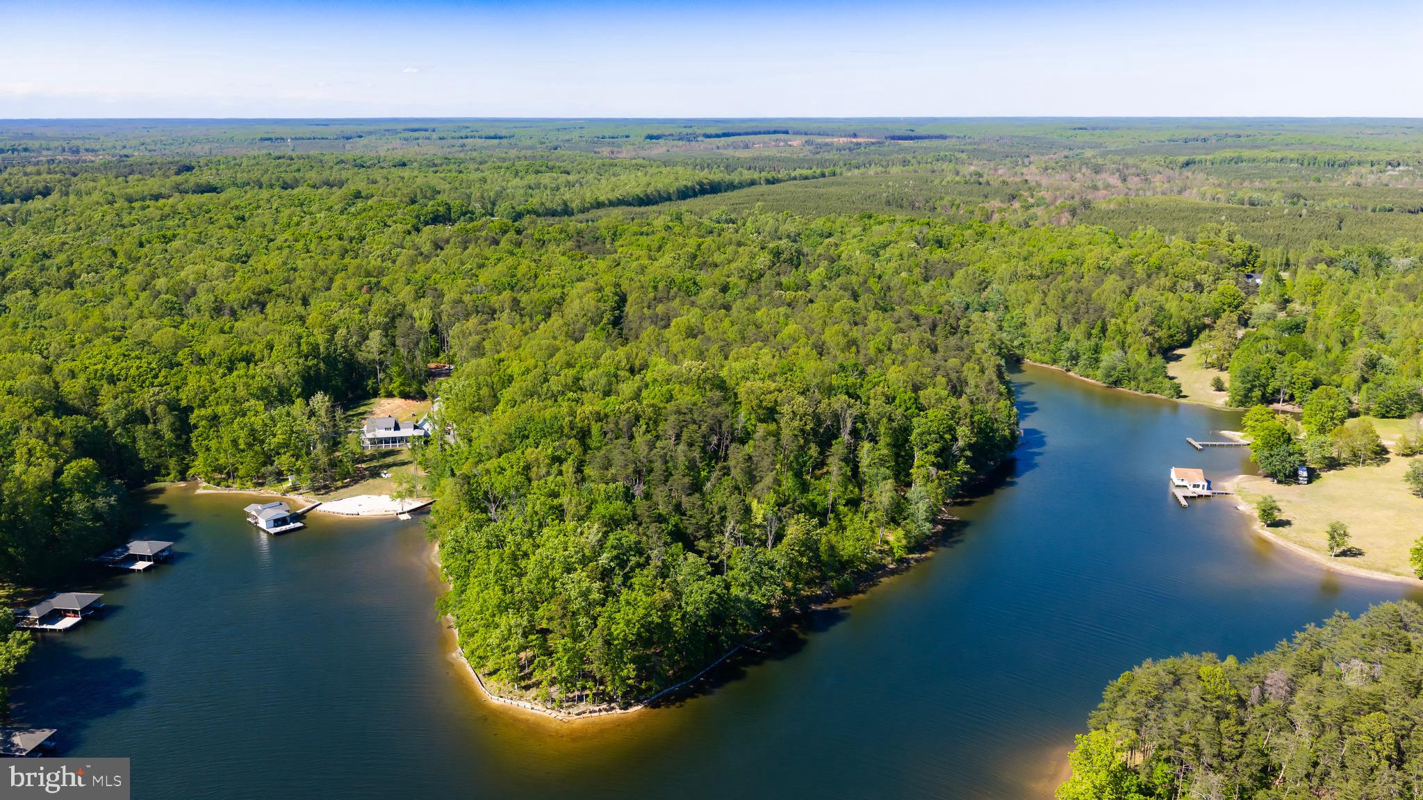 0 Minor Road Bumpass, VA 23024 - Photo 2 of 22 a view of a lake with a yard