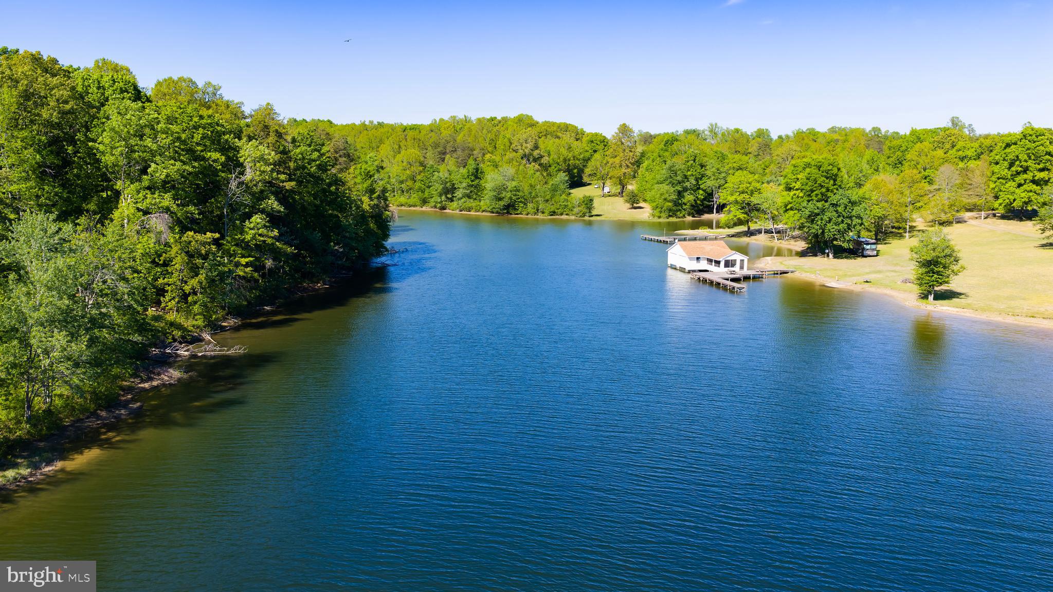 0 Minor Road Bumpass, VA 23024 - Photo 6 of 22 a view of a lake with houses