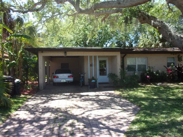 a house view with a outdoor space