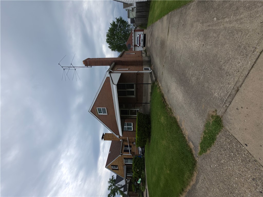 3109 Shroyer Road Kettering, OH 45429 - Photo 24 of 25 This classic brick residence features an inviting front facade and a convenient driveway.