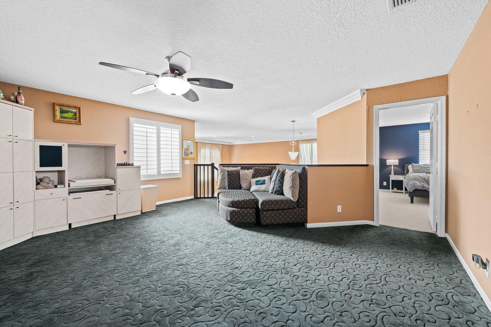 12781 Yardley Drive Boca Raton, FL 33428 - Photo 20 of 55 a living room with furniture and a flat screen tv