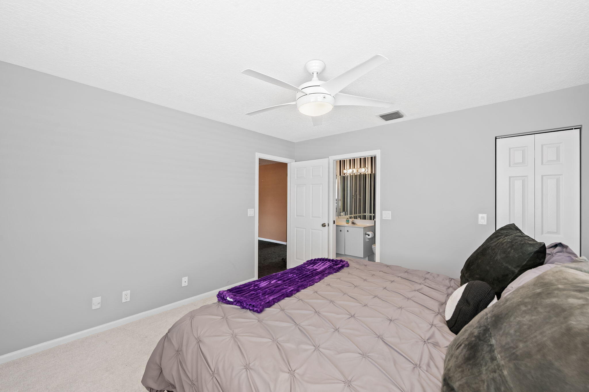 12781 Yardley Drive Boca Raton, FL 33428 - Photo 23 of 55 a bedroom with a bed and a window