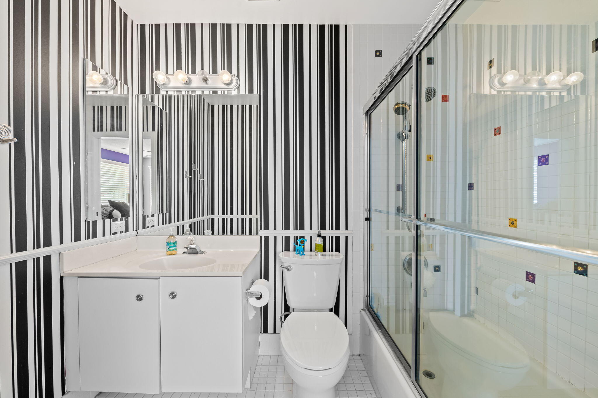 12781 Yardley Drive Boca Raton, FL 33428 - Photo 24 of 55 a bathroom with a sink toilet and shower