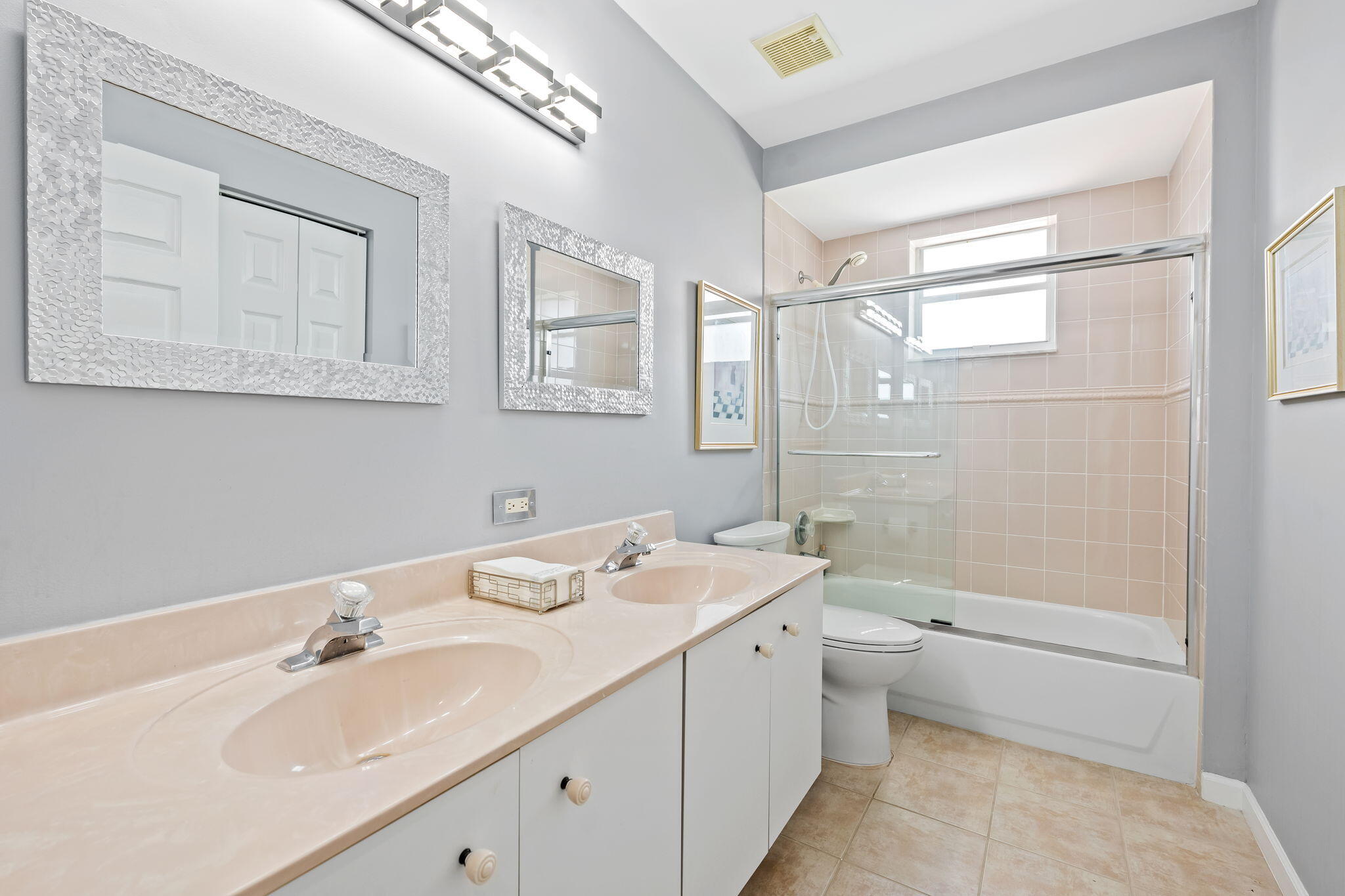 12781 Yardley Drive Boca Raton, FL 33428 - Photo 27 of 55 a bathroom with a sink a toilet and shower