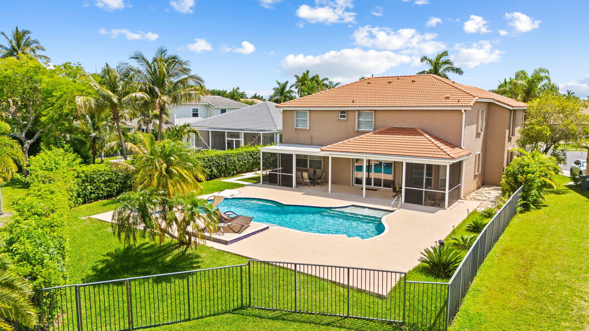 12781 Yardley Drive Boca Raton, FL 33428 - Photo 3 of 55 a front view of a house with a yard