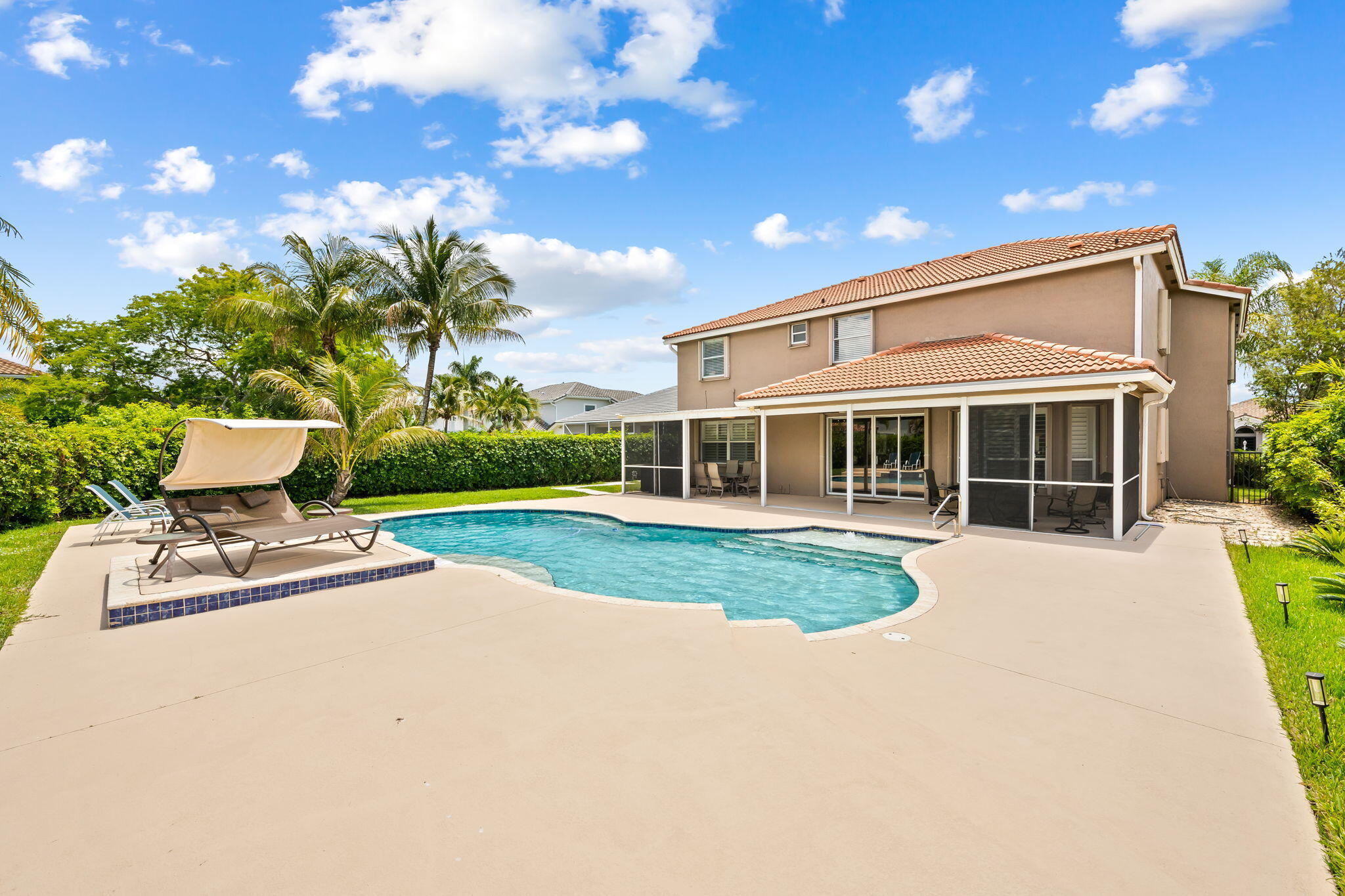 12781 Yardley Drive Boca Raton, FL 33428 - Photo 32 of 55 a front view of a house with a yard