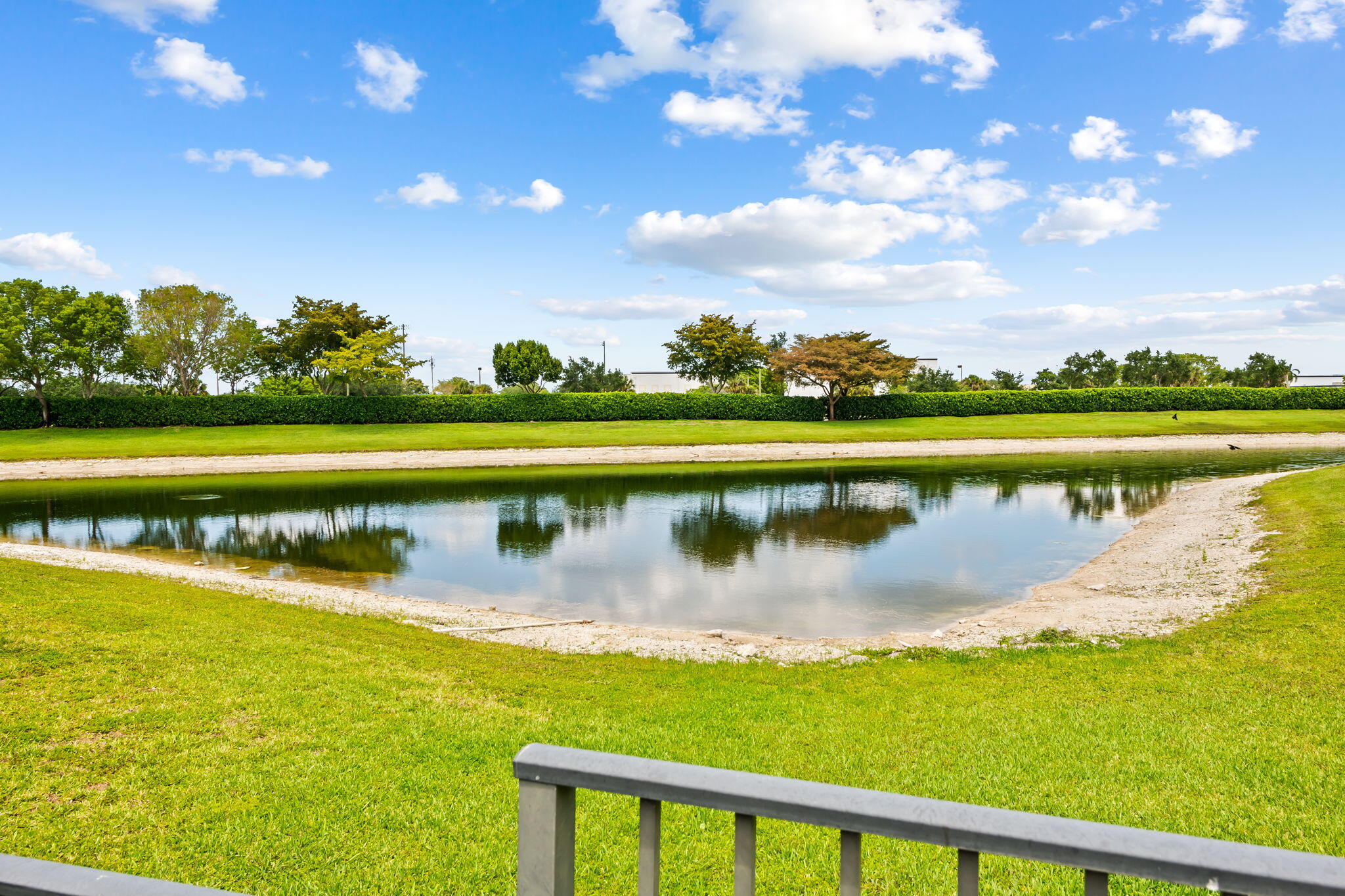12781 Yardley Drive Boca Raton, FL 33428 - Photo 33 of 55 a view of a lake with a big yard