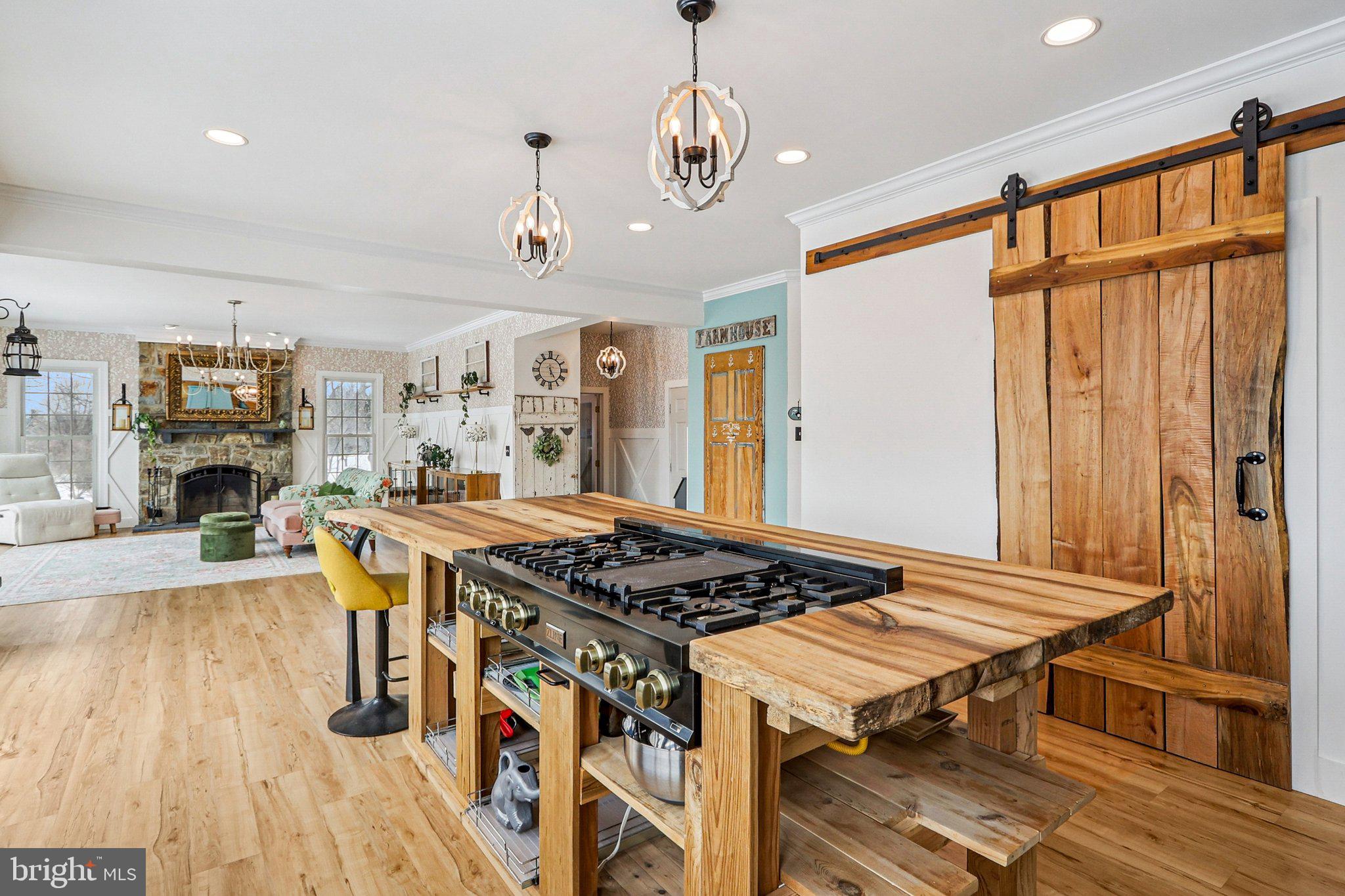 19075 Foxgreen Circle Leesburg, VA 20175 - Photo 15 of 71 a kitchen with stainless steel appliances granite countertop a stove and a refrigerator