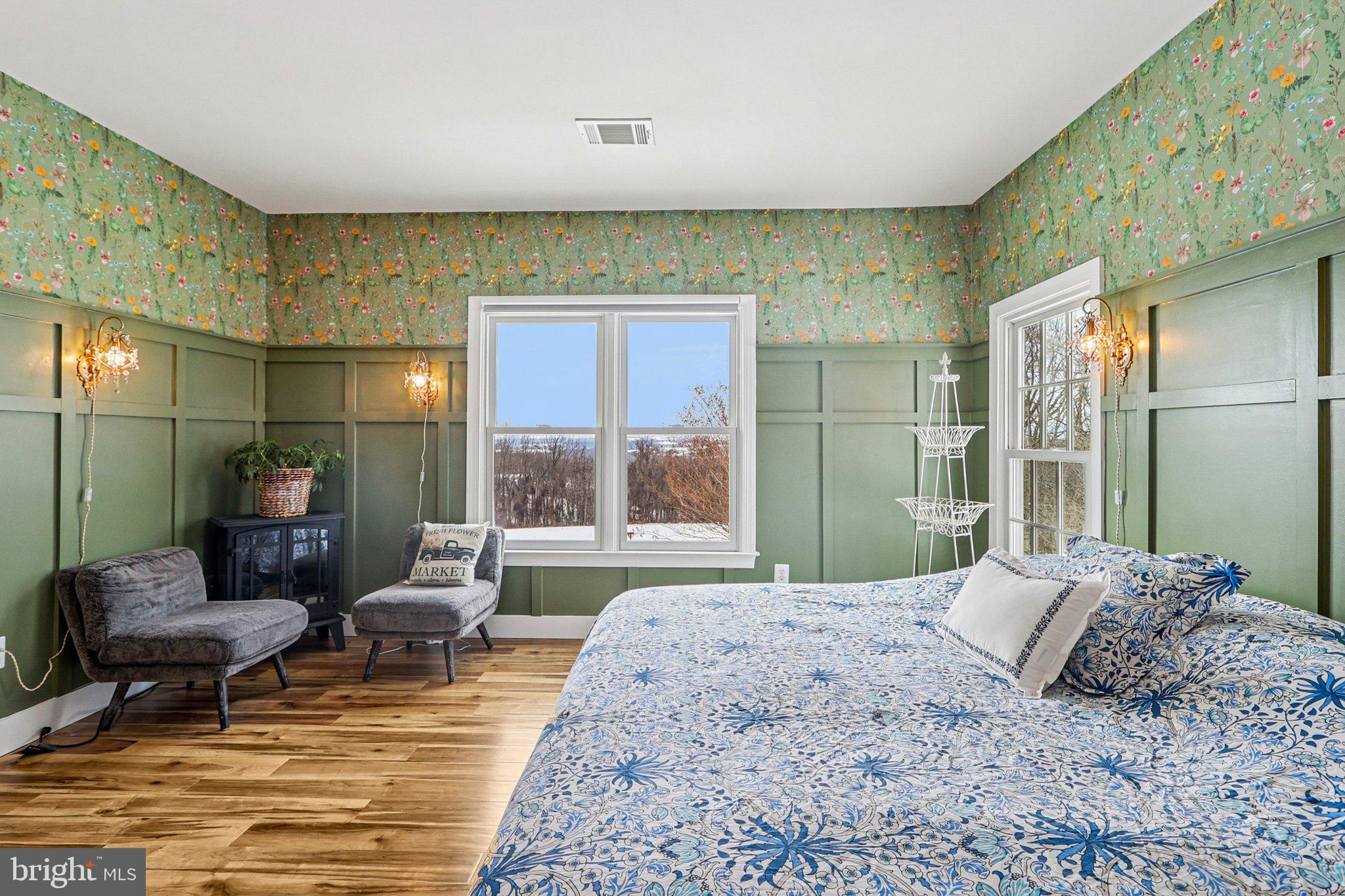19075 Foxgreen Circle Leesburg, VA 20175 - Photo 28 of 71 a bedroom with a bed and glass window