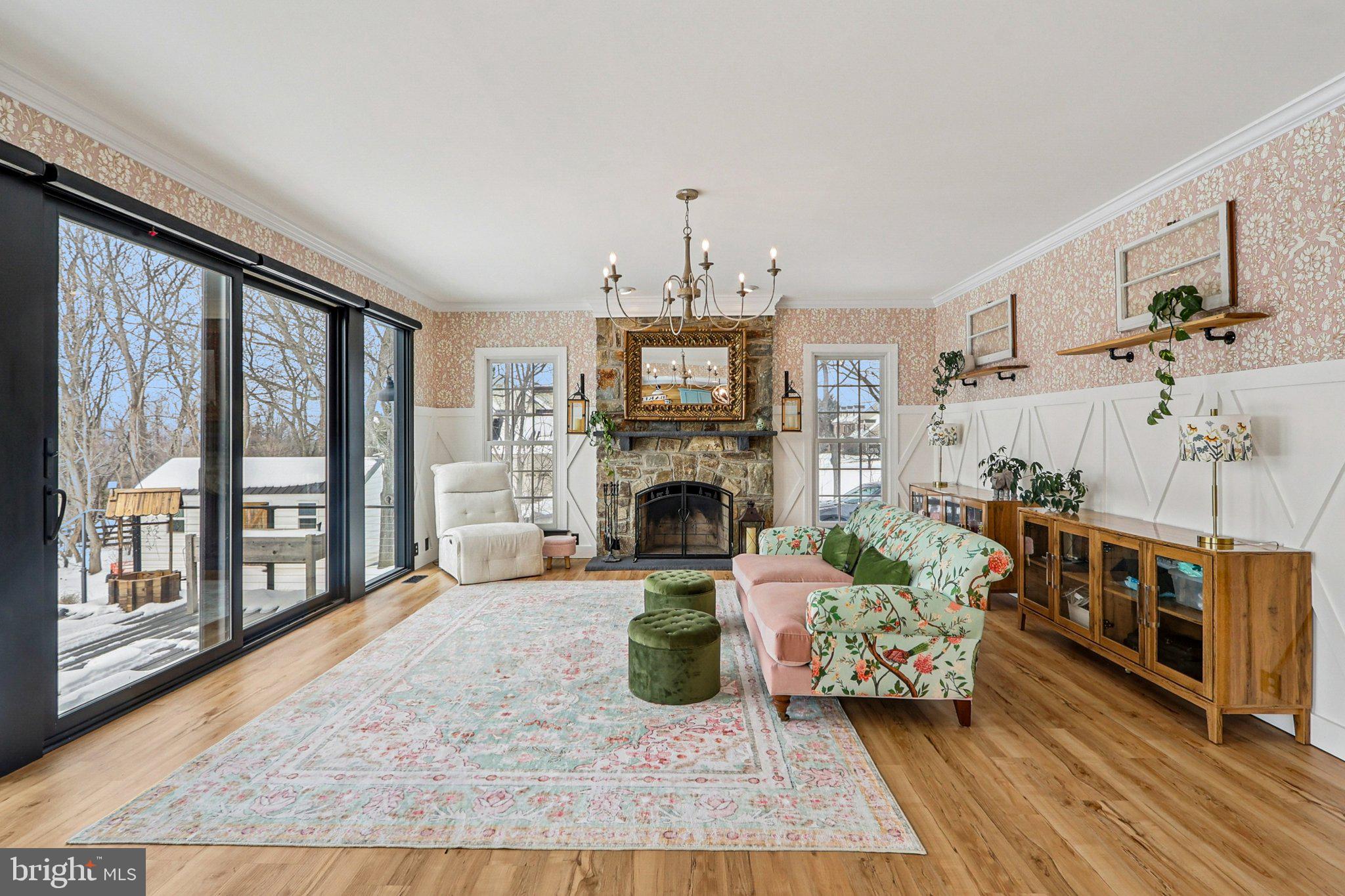 19075 Foxgreen Circle Leesburg, VA 20175 - Photo 5 of 71 a living room with furniture and a fireplace