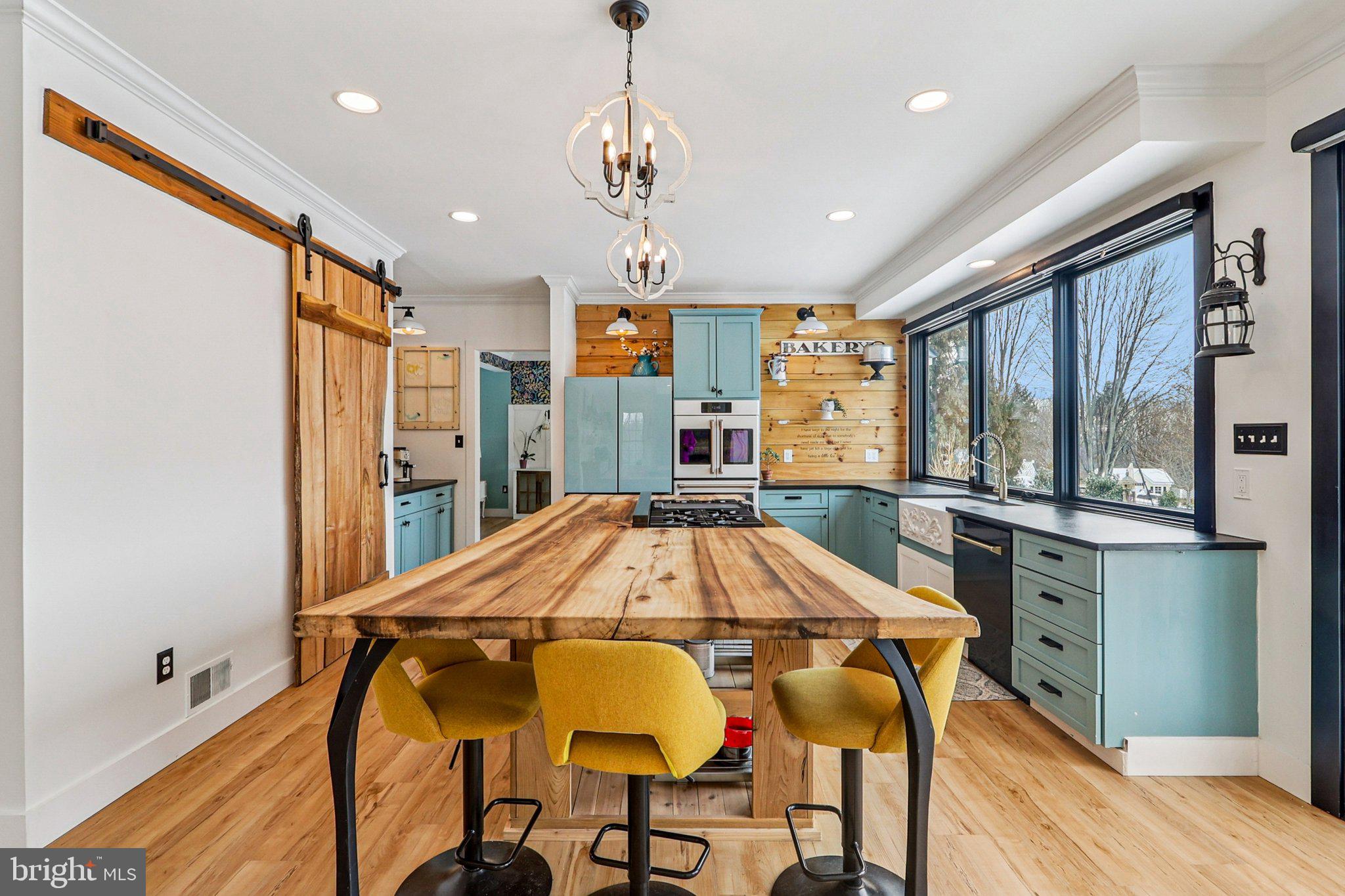 19075 Foxgreen Circle Leesburg, VA 20175 - Photo 10 of 71 a view of a dining room with furniture window and wooden floor