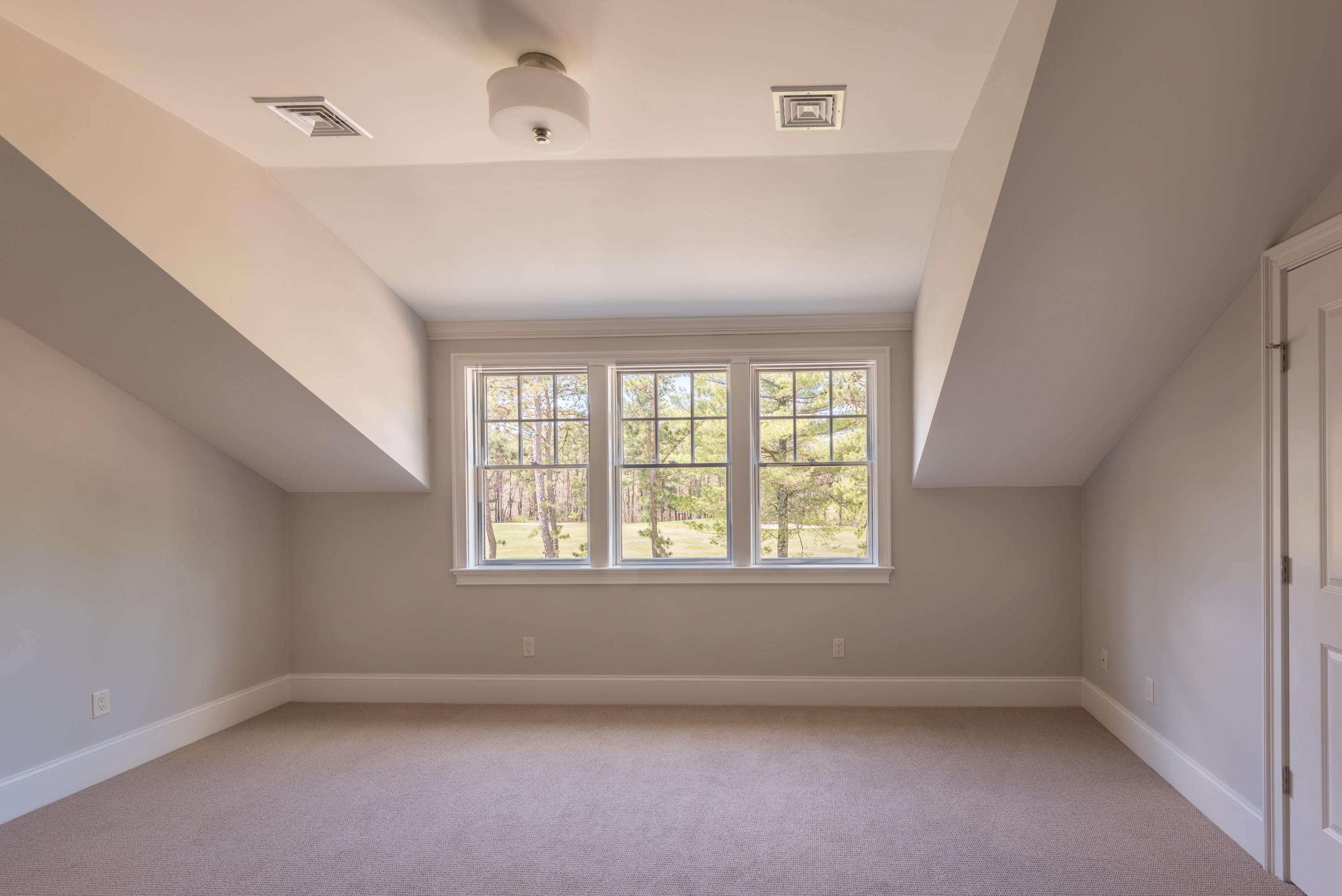 40 Clayton Circle, Unit B Mashpee, MA 02649 - Photo 10 of 11 an empty room with a window
