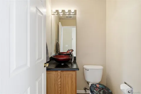 a bathroom with a toilet and a sink