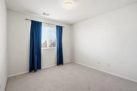 an empty room with closet