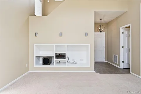 a view of livingroom and fireplace