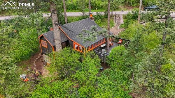 an aerial view of a house having yard