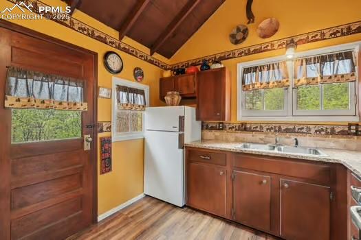 6015 Sioux Trail Cascade, CO 80809 - Photo 15 of 42 a utility room with a sink a washer and dryer
