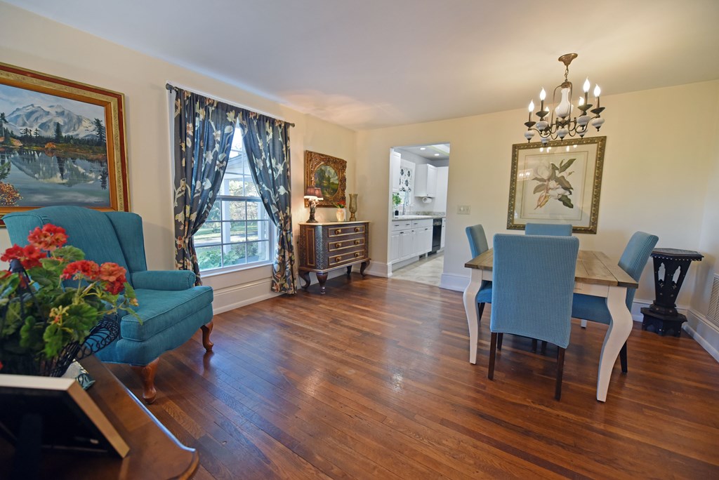 63 Loving Road Morganton, GA 30560 - Photo 21 of 58 a view of a dining room with furniture window and wooden floor