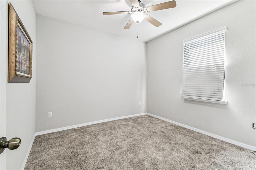 11150 Paradise Pointe Way New Port Richey, FL 34654 - Photo 20 of 91 a view of an empty room with a window