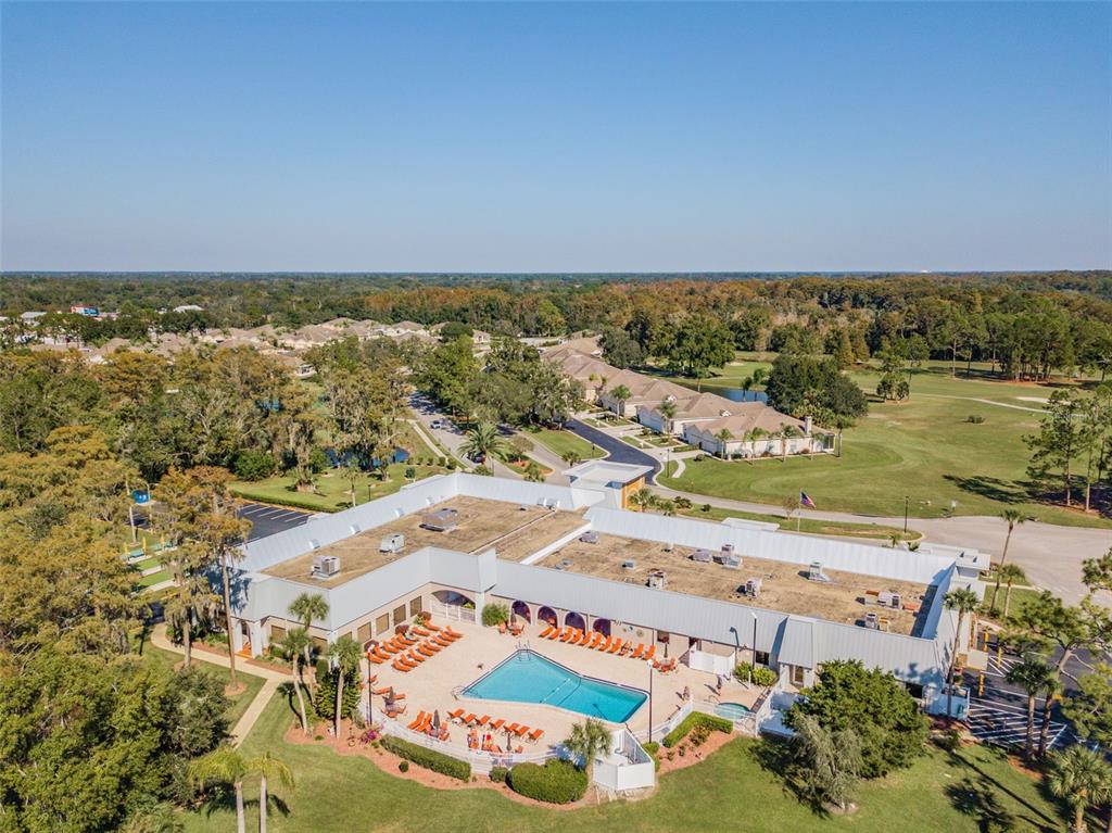 11150 Paradise Pointe Way New Port Richey, FL 34654 - Photo 52 of 91 an aerial view of ocean and residential houses with outdoor space
