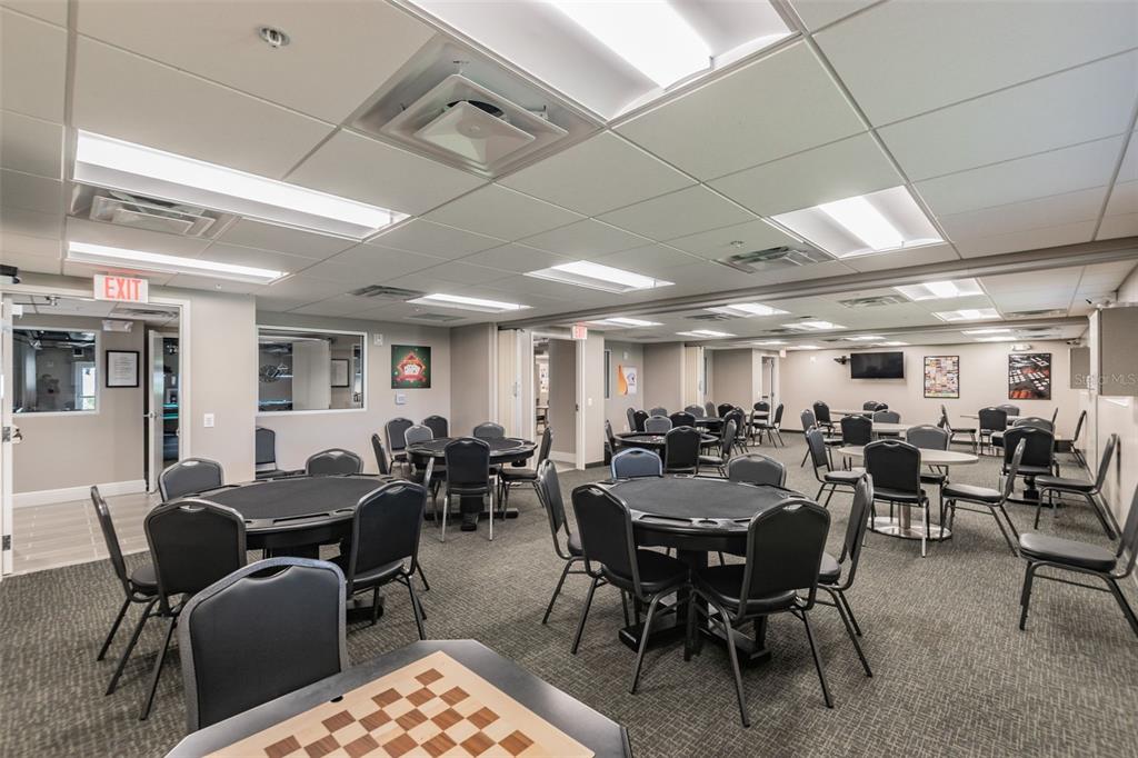 11150 Paradise Pointe Way New Port Richey, FL 34654 - Photo 77 of 91 a view of a dining room with furniture