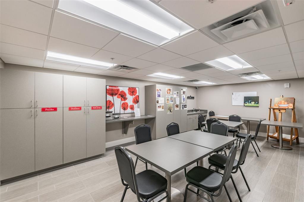 11150 Paradise Pointe Way New Port Richey, FL 34654 - Photo 79 of 91 a view of a dining room with furniture