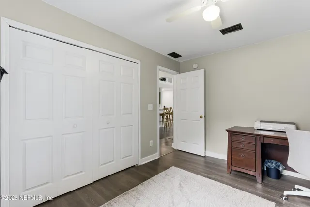 a view of a livingroom with furniture and a fireplace