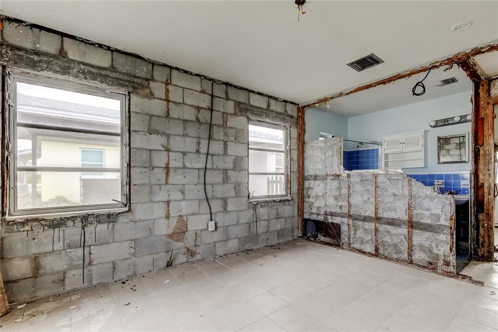245 145th Avenue Madeira Beach, FL 33708 - Photo 28 of 37 a view of an empty room with a window