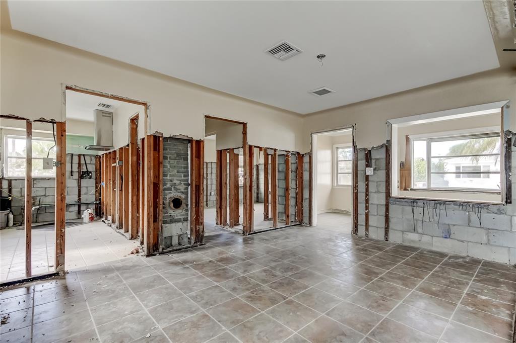 245 145th Avenue Madeira Beach, FL 33708 - Photo 31 of 37 a view of an empty room with stairs