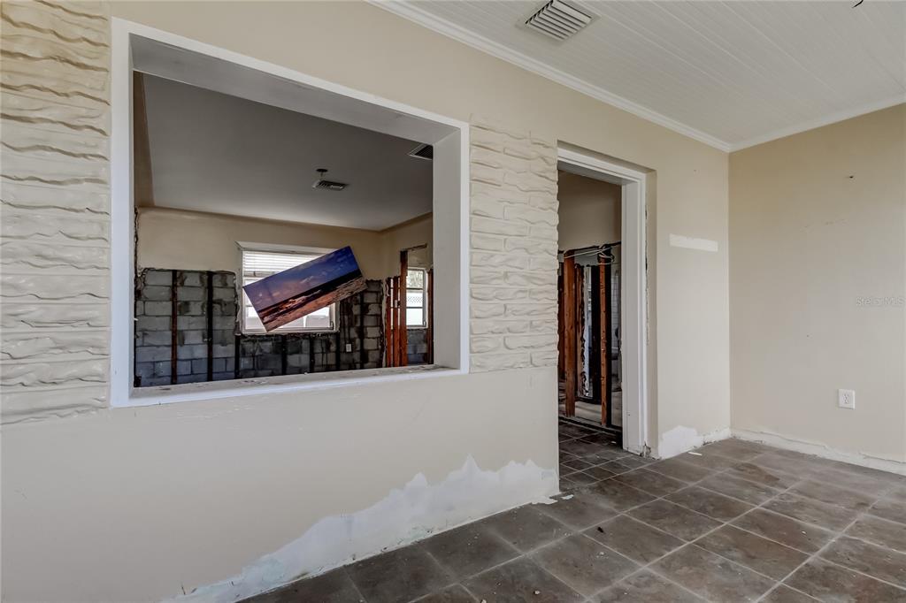 245 145th Avenue Madeira Beach, FL 33708 - Photo 34 of 37 a view of a door and a window