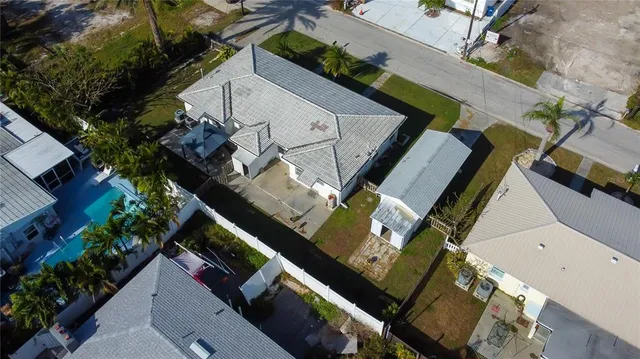 an aerial view of a house with a garden