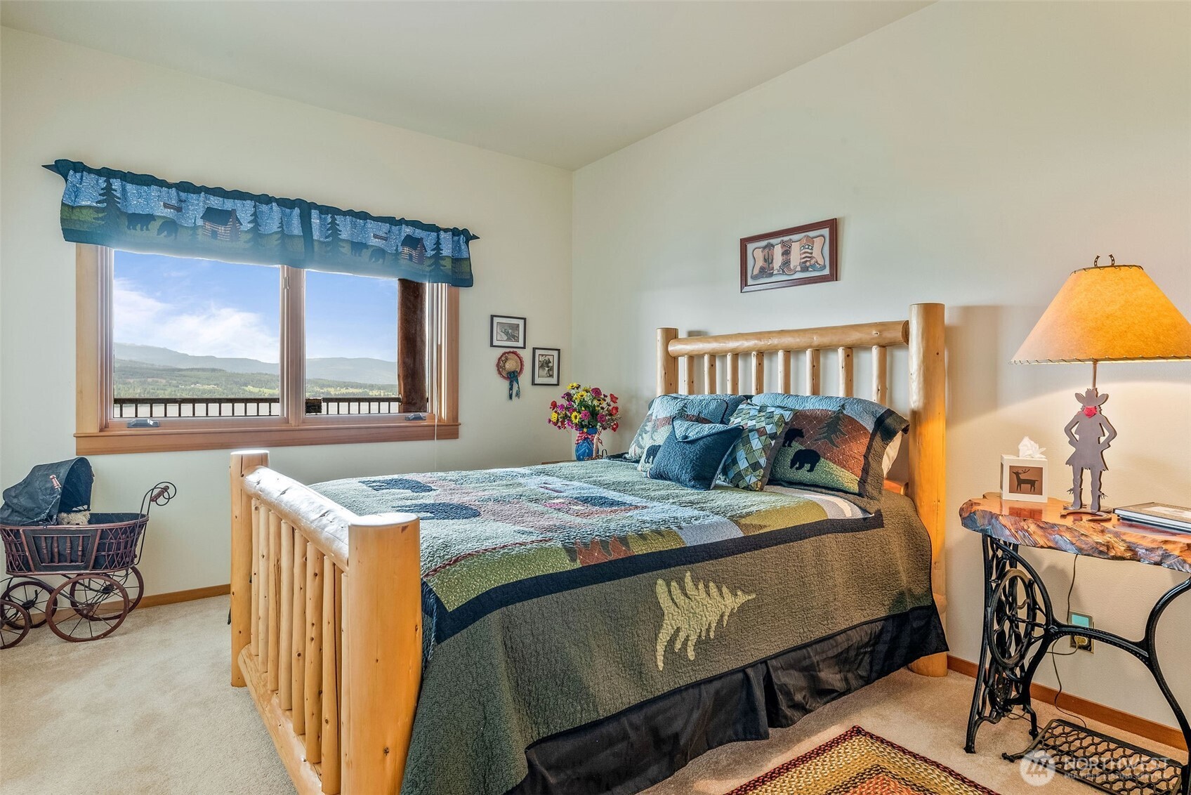 53 Combs Place Port Townsend, WA 98368 - Photo 31 of 40 a bed room with a bed and a chair